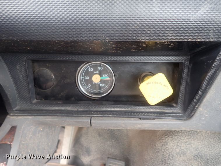 image for item DE0797 1995 Ford F800  truck with Vermeer tree spade