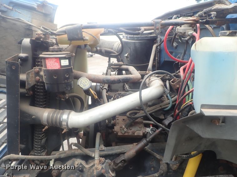 image for item DE0797 1995 Ford F800  truck with Vermeer tree spade