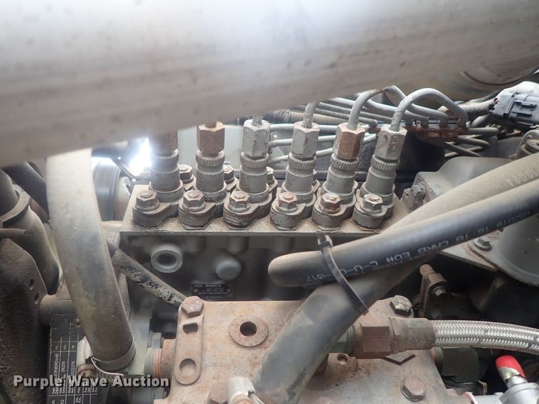 image for item DE0797 1995 Ford F800  truck with Vermeer tree spade