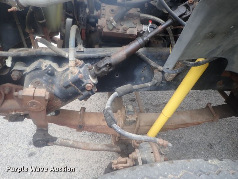 image for item DE0797 1995 Ford F800  truck with Vermeer tree spade