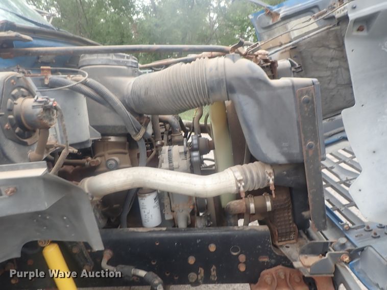 image for item DE0797 1995 Ford F800  truck with Vermeer tree spade