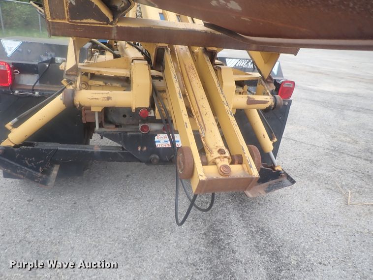 image for item DE0797 1995 Ford F800  truck with Vermeer tree spade