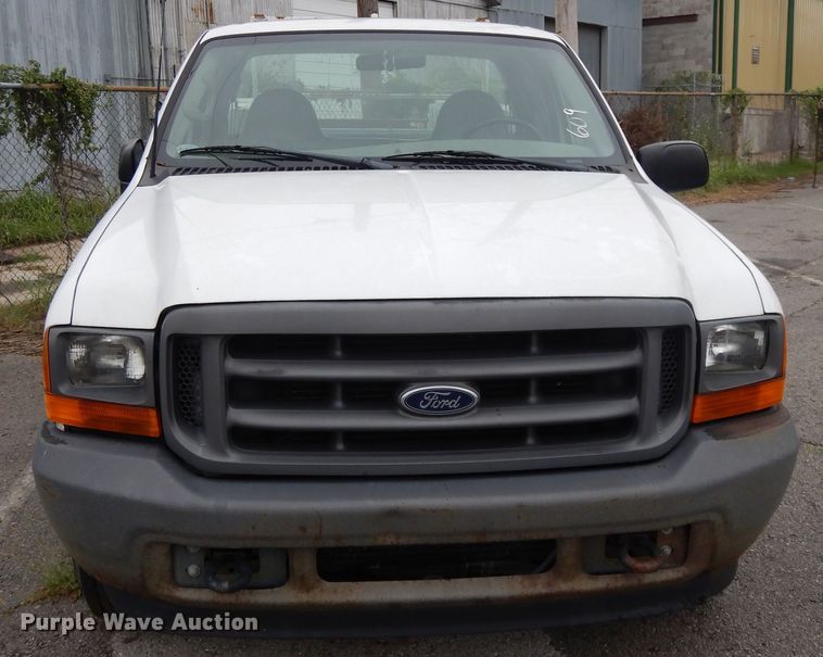 image for item DG8999 2001 Ford F250 Super Duty  SuperCab utility bed pickup truck