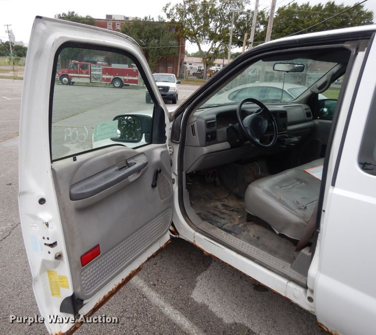 image for item DG8999 2001 Ford F250 Super Duty  SuperCab utility bed pickup truck