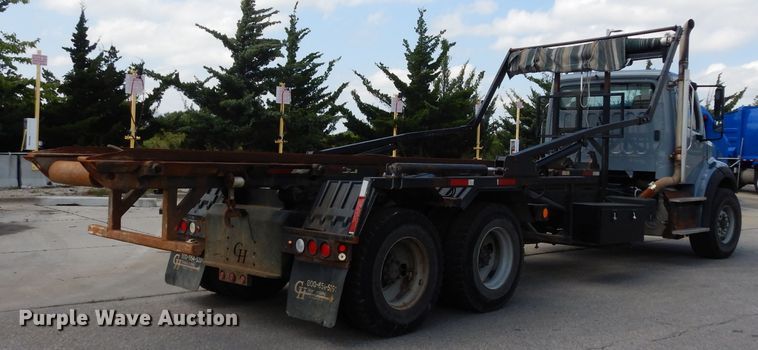 image for item DJ6750 2011 Freightliner Business Class M2  roll off container truck