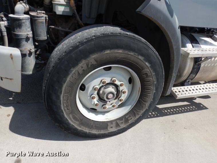 image for item DJ6750 2011 Freightliner Business Class M2  roll off container truck