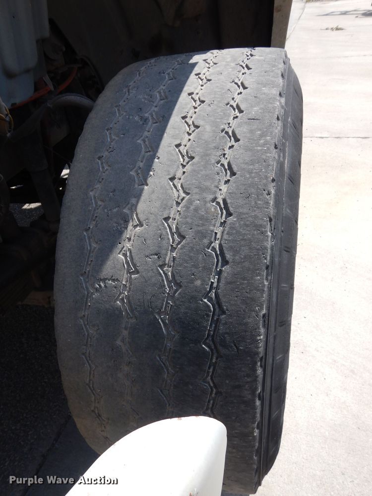 image for item DJ6750 2011 Freightliner Business Class M2  roll off container truck