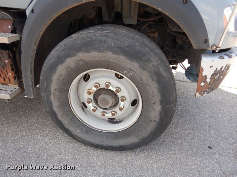 image for item DJ6750 2011 Freightliner Business Class M2  roll off container truck