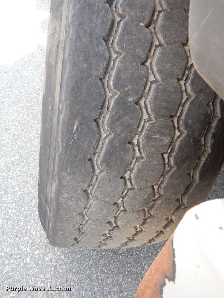 image for item DJ6750 2011 Freightliner Business Class M2  roll off container truck