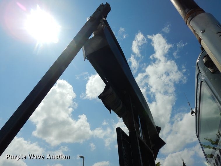 image for item DJ6750 2011 Freightliner Business Class M2  roll off container truck