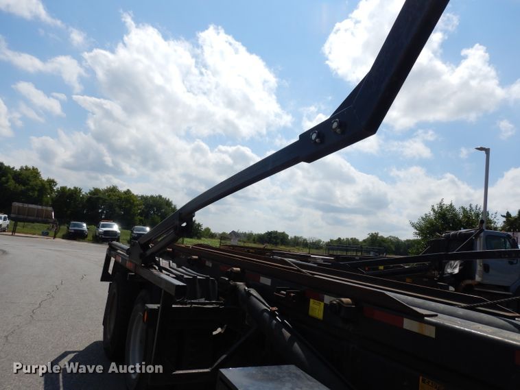 image for item DJ6750 2011 Freightliner Business Class M2  roll off container truck