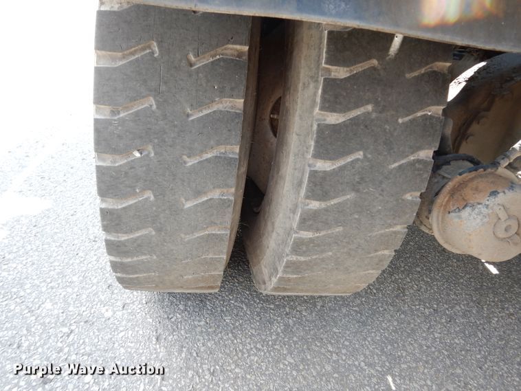 image for item DJ6750 2011 Freightliner Business Class M2  roll off container truck