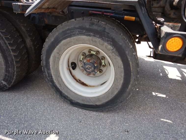 image for item DJ6750 2011 Freightliner Business Class M2  roll off container truck