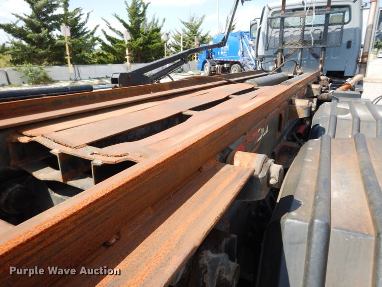 image for item DJ6750 2011 Freightliner Business Class M2  roll off container truck