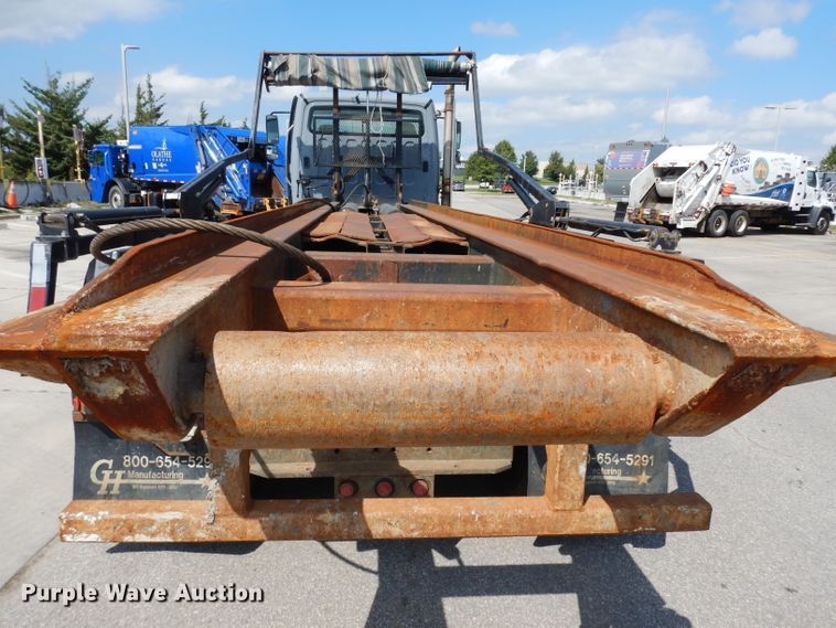 image for item DJ6750 2011 Freightliner Business Class M2  roll off container truck