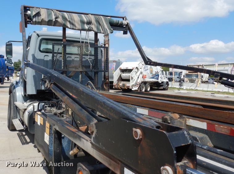 image for item DJ6750 2011 Freightliner Business Class M2  roll off container truck