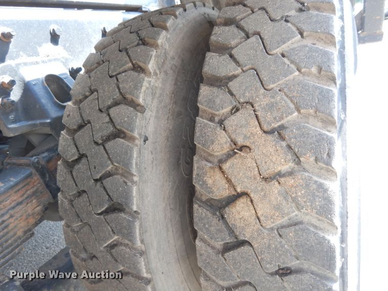 image for item DJ6750 2011 Freightliner Business Class M2  roll off container truck