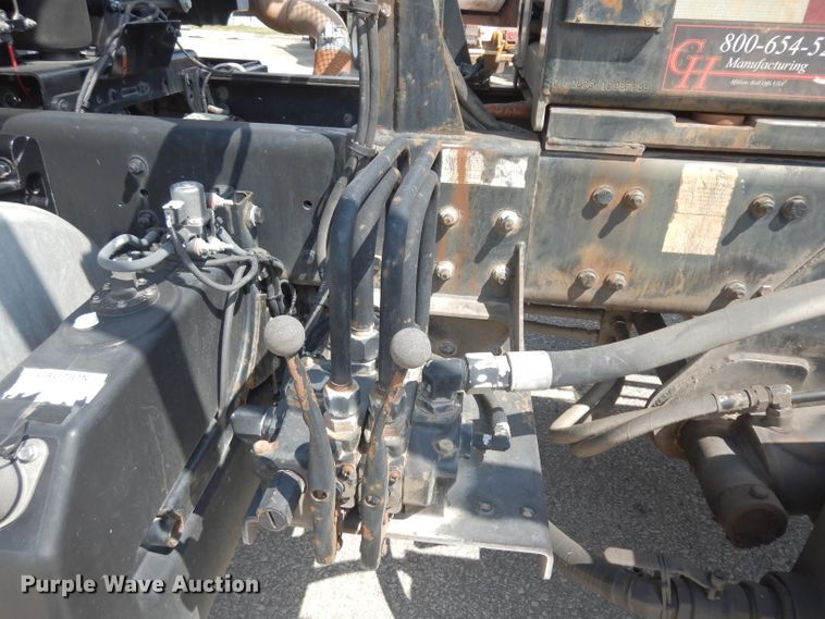 image for item DJ6750 2011 Freightliner Business Class M2  roll off container truck