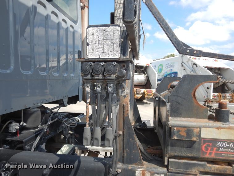 image for item DJ6750 2011 Freightliner Business Class M2  roll off container truck