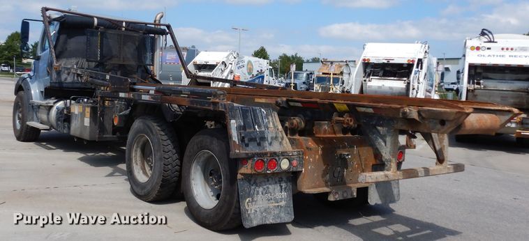 image for item DJ6751 2011 Freightliner Business Class M2  roll off container truck