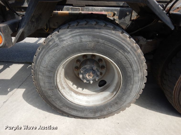 image for item DJ6751 2011 Freightliner Business Class M2  roll off container truck