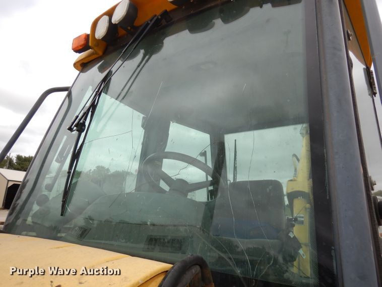 image for item DJ6817 New Holland LB75B  backhoe