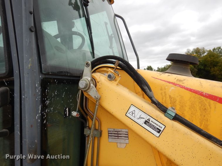 image for item DJ6817 New Holland LB75B  backhoe