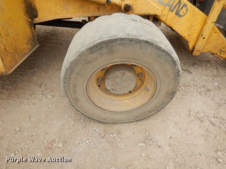 image for item DJ6817 New Holland LB75B  backhoe