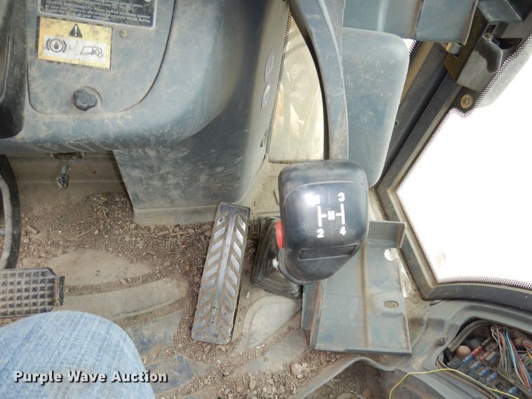 image for item DJ6817 New Holland LB75B  backhoe