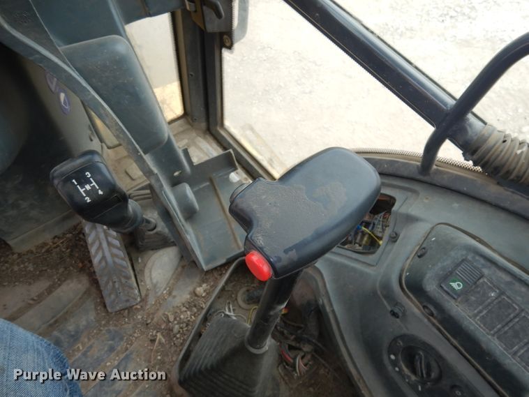 image for item DJ6817 New Holland LB75B  backhoe