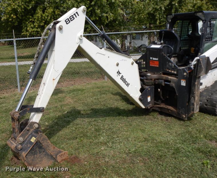 image for item HJ9709 Bobcat 8811 skid steer backhoe attachment