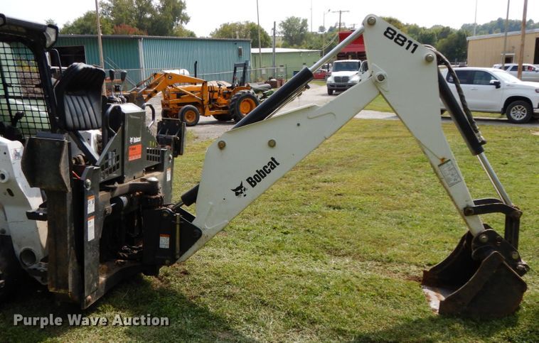 image for item HJ9709 Bobcat 8811 skid steer backhoe attachment