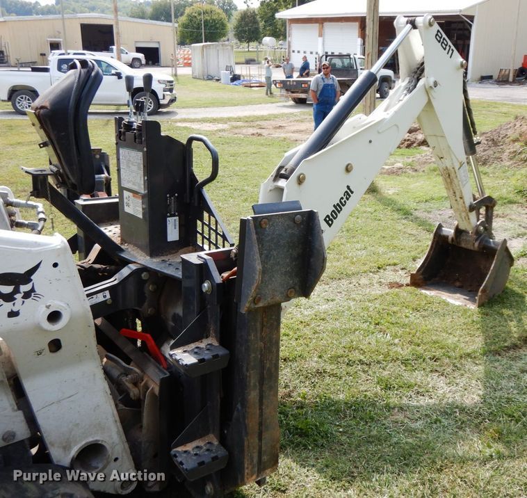 image for item HJ9709 Bobcat 8811 skid steer backhoe attachment