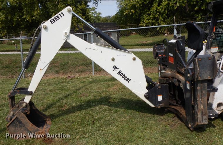 image for item HJ9709 Bobcat 8811 skid steer backhoe attachment
