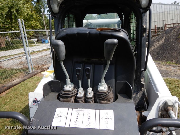 image for item HJ9709 Bobcat 8811 skid steer backhoe attachment