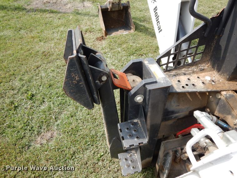 image for item HJ9709 Bobcat 8811 skid steer backhoe attachment