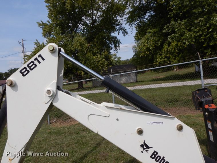 image for item HJ9709 Bobcat 8811 skid steer backhoe attachment