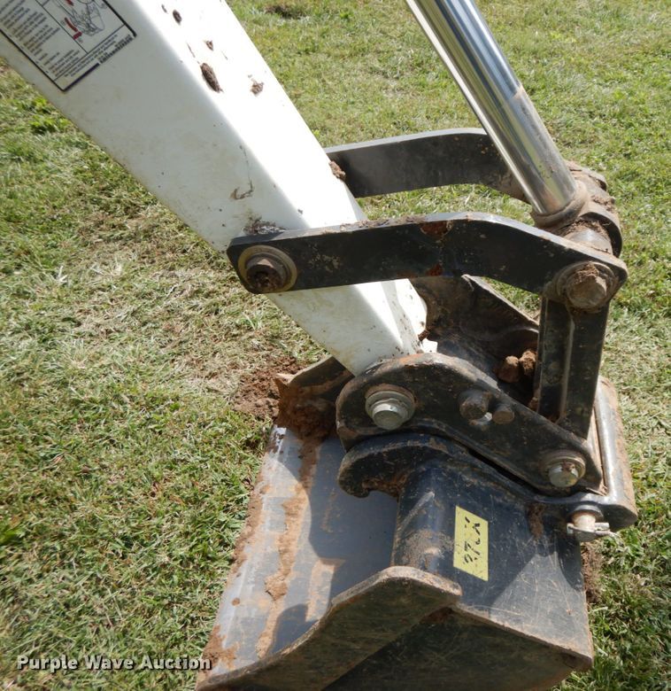 image for item HJ9709 Bobcat 8811 skid steer backhoe attachment