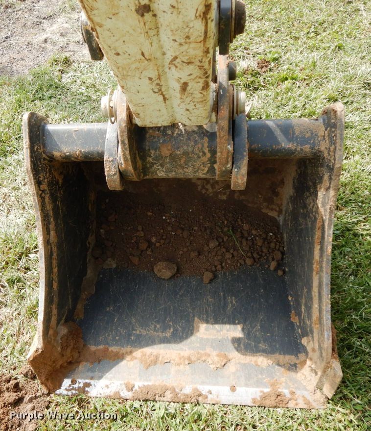 image for item HJ9709 Bobcat 8811 skid steer backhoe attachment