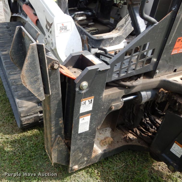 image for item HJ9709 Bobcat 8811 skid steer backhoe attachment