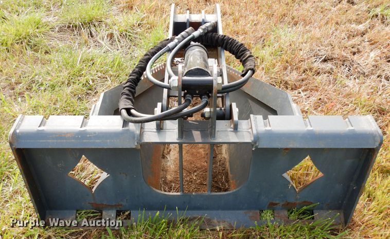 image for item GQ9769 Grotrian Enterprises skid steer root grapple bucket