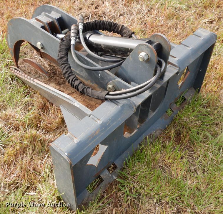 image for item GQ9769 Grotrian Enterprises skid steer root grapple bucket