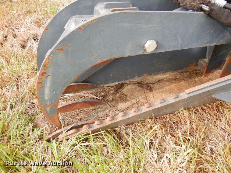 image for item GQ9769 Grotrian Enterprises skid steer root grapple bucket