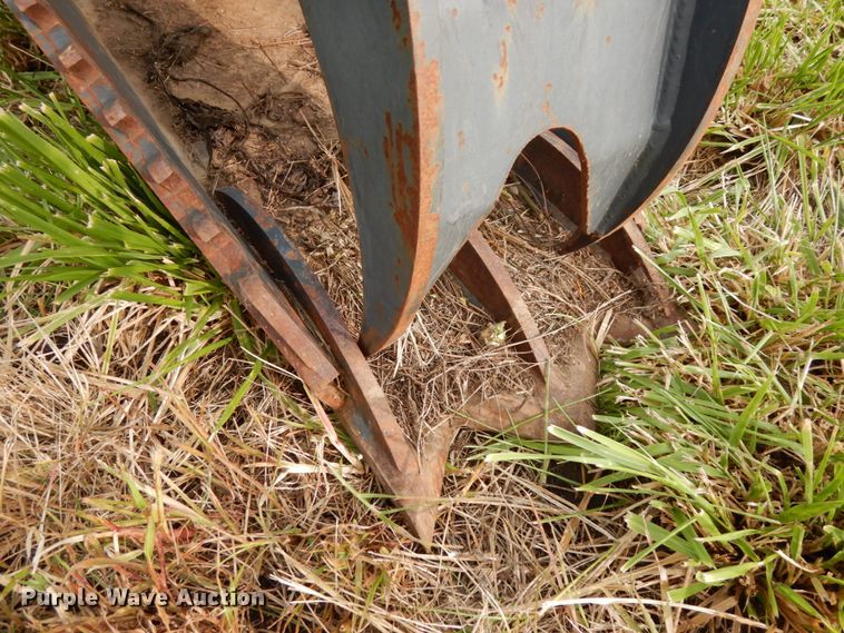 image for item GQ9769 Grotrian Enterprises skid steer root grapple bucket