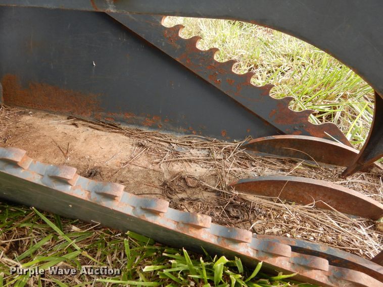 image for item GQ9769 Grotrian Enterprises skid steer root grapple bucket