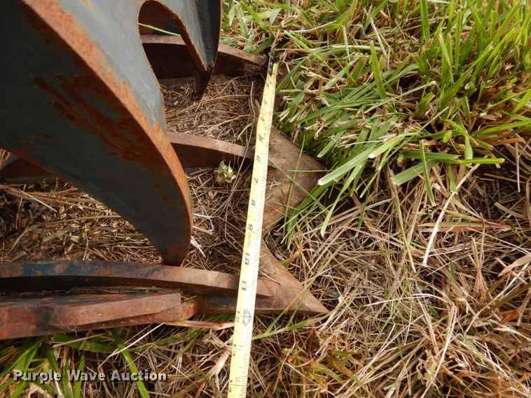 image for item GQ9769 Grotrian Enterprises skid steer root grapple bucket