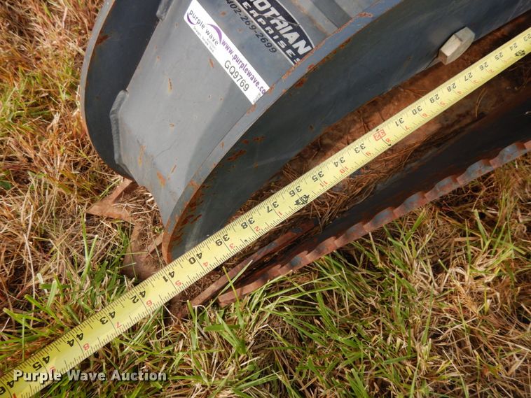 image for item GQ9769 Grotrian Enterprises skid steer root grapple bucket