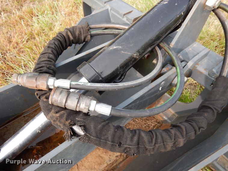 image for item GQ9769 Grotrian Enterprises skid steer root grapple bucket