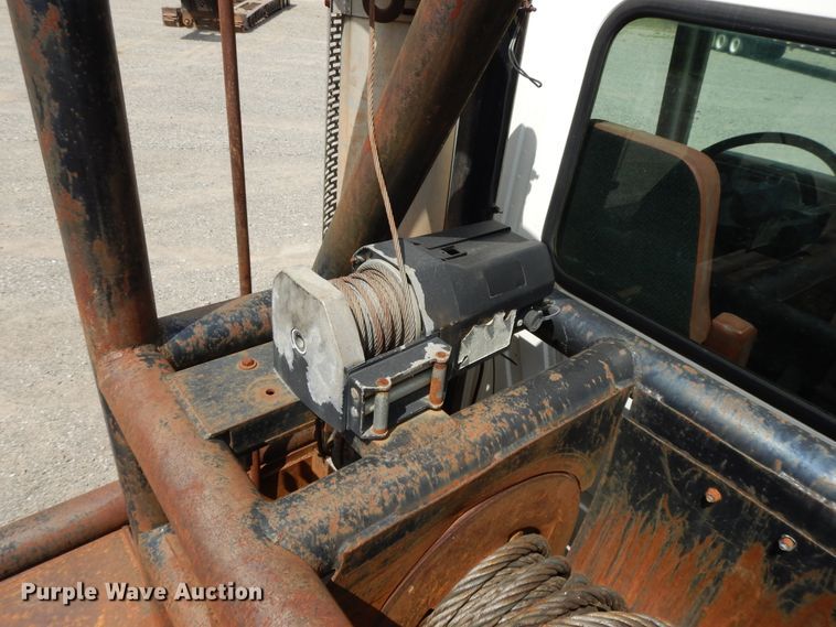 image for item DI0423 2002 Mack CV713  winch truck