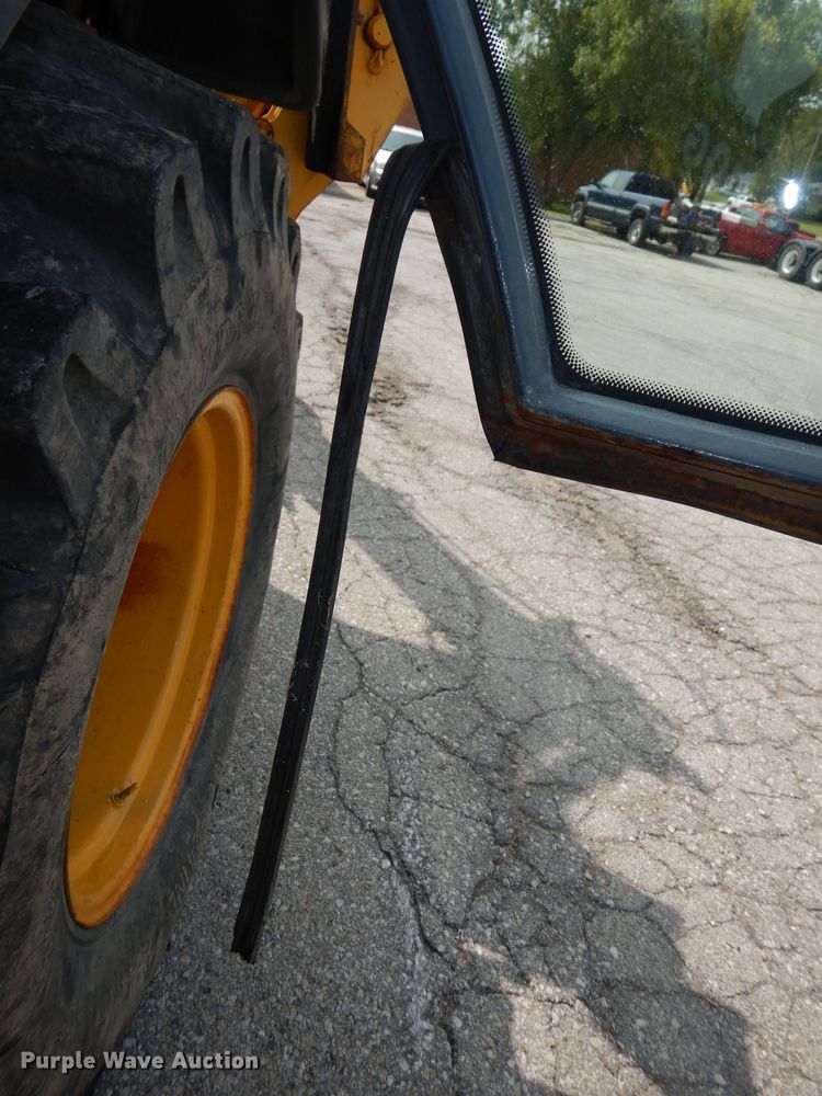 image for item DJ6767 2004 John Deere 310G  backhoe